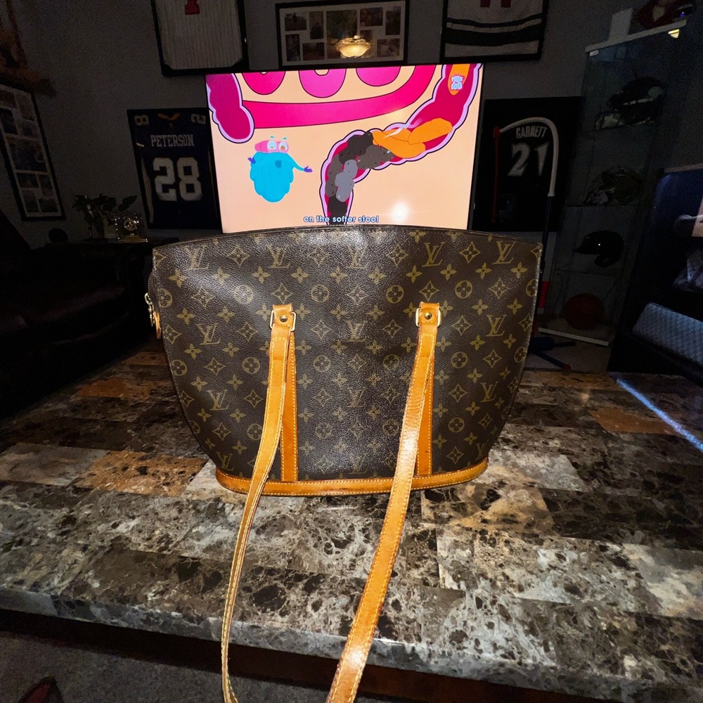 Authentic Louis Vuitton Babylon shoulder bag